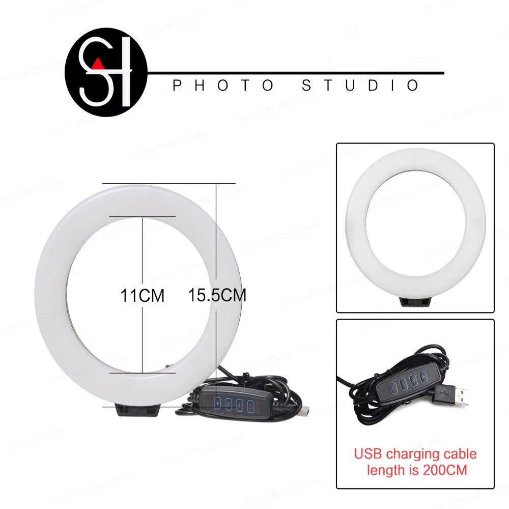 The 6 - inch mini LED desktop video ring light with a tripod stand and USB plug is a versatile lighting tool for live photo photography in a studio setting. - Dymand